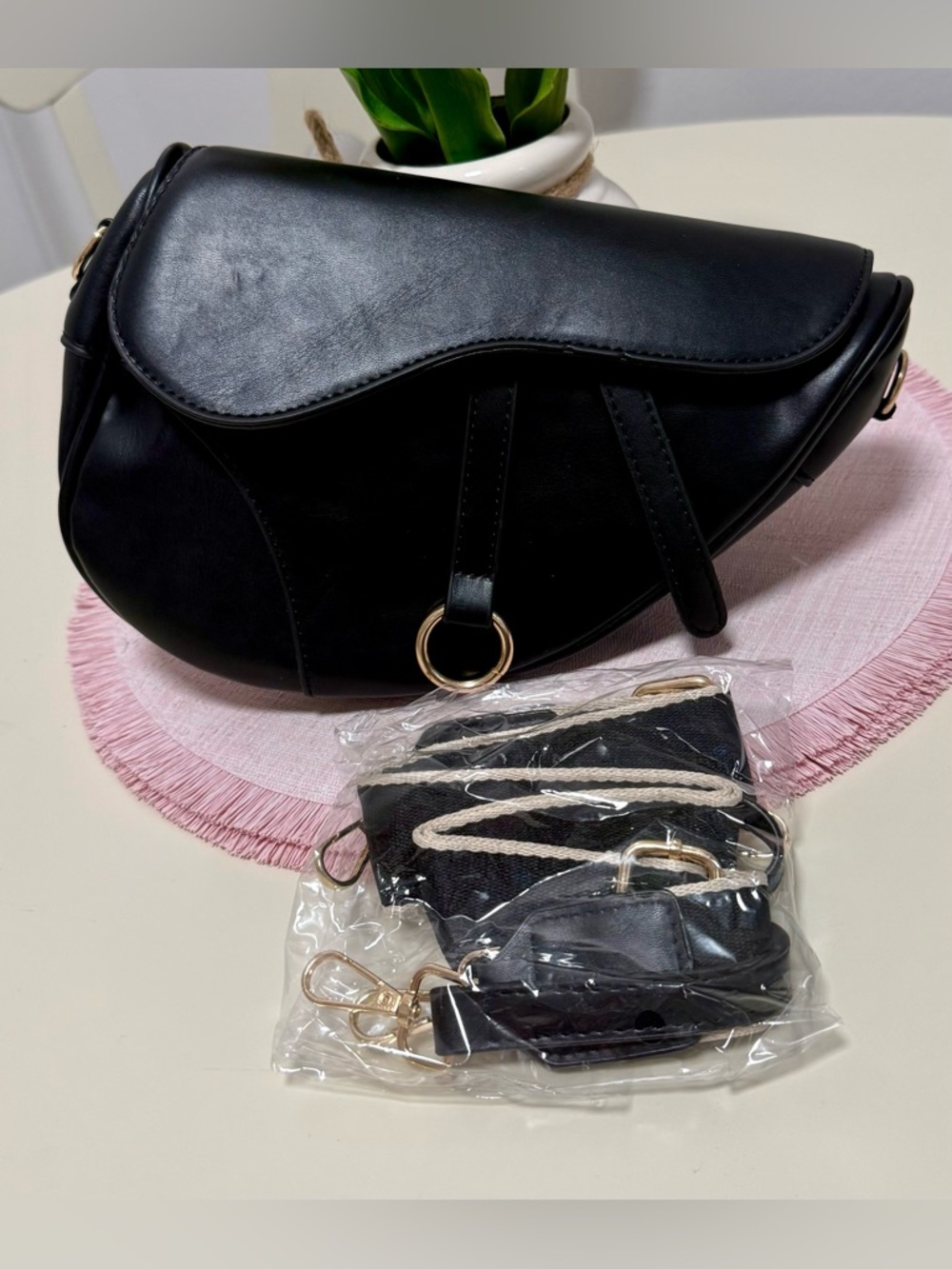 Black Leather Saddle Crossbody Bag with Gold Ring Accent